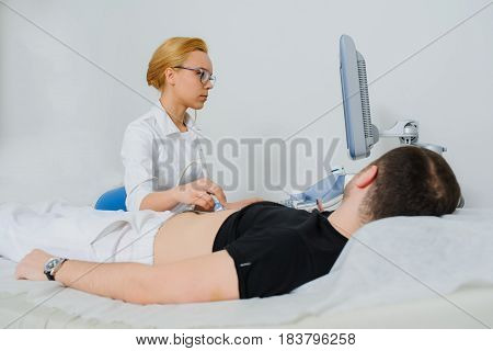 Doctor Examine A Patient Abdomen Usg