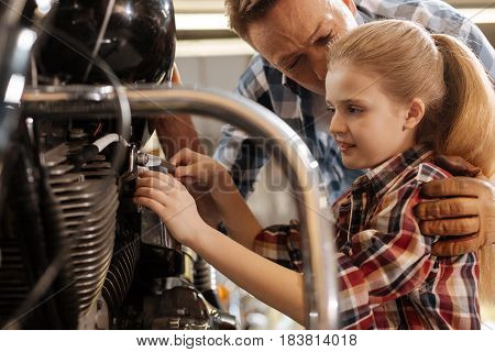 You do a great job. Loving emotional nice father teaching his kid and kissing her while feeling proud