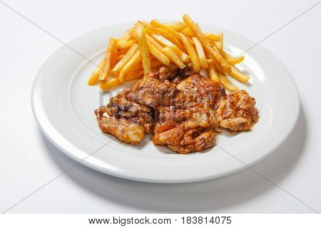 Fried Chicken With Fries On White Plate