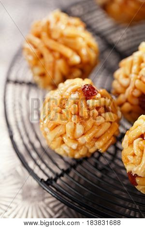 Chak-chak traditional asian sweet dessert - fried dough with honey