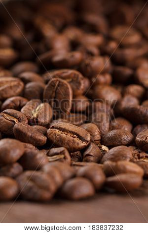 Coffee Beans Roasted On Wood Background, Macro
