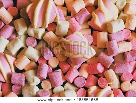 Marshmallows Background or texture of colorful mini marshmallows Texture of multi-colored marshmallows in different sizes and shapes