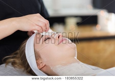 Woman Getting Enzymatic Peeling At Beautician's