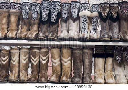 Nenets boots from deer fur are selling in the winter street