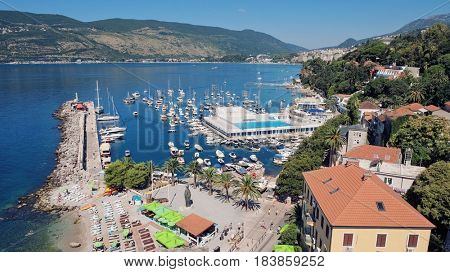 HERCEG NOVI, MONTENEGRO - JULY 18, 2016: aerial view of Kotor Bay and marina Herceg Novi with pleasure boat moored and sea pool