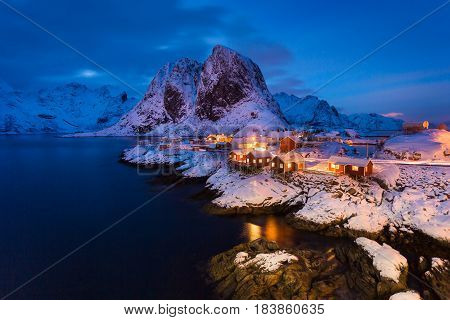 Snowy Hamnoy village in the Lofoten islands at night