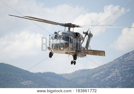 Black hawk helicopter rescue team,close upnose down low flight maneuvering