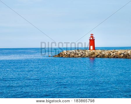 Red Lighthouse At The Port Of Entry Reporting