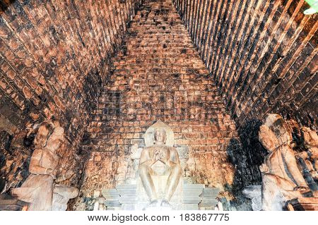 Buddha Statues Of Mendut Buddhist Temple In Central Java