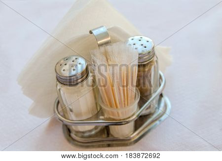 Salt and pepper on table in restaurant table