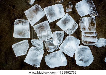 Frozen Ice Cubes On Rustic Background