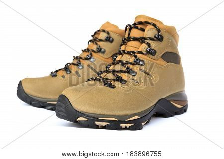 closeup of new hiking boots on white