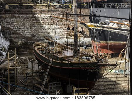 sail boat in maintenance in a drydock