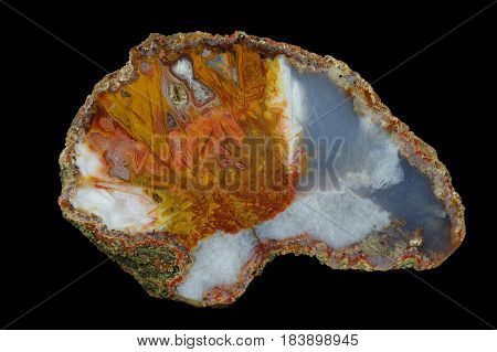 A cross section of the agate stone. Multicolored silica bands colored with metal oxides are visible. Origin: Asni Atlas Mountains Morocco.