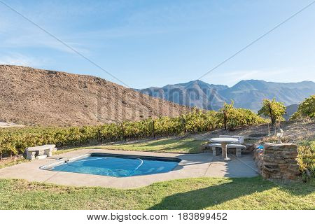MONTAGU SOUTH AFRICA - MARCH 25 2017: The swimming pool at the Badensfontein Caravan Park near Montagu in the Western Cape Province