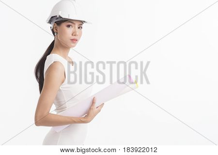 Sexy girl structural engineer holding drafting paper with copy space for product or text white background photo