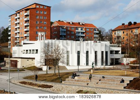 Sodertalje Sweden - April 1 2017: The catholic church's white buildinglocated at Biborgsgatan in front of residential building