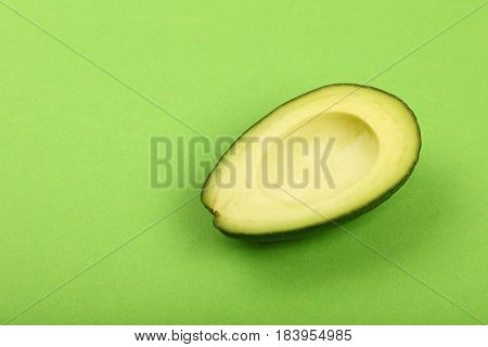 Fresh Ripe Avocado On Green Paper