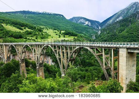 Mountain landscape, Montenegro. Durdevica Tara arc bridge in the mountains