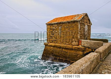 Cadiz seascape Spain. Road to Castle of San Sebastian