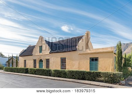 MONTAGU SOUTH AFRICA - MARCH 26 2017: An historic building with thatch roof in Montagu a town in the Western Cape Province