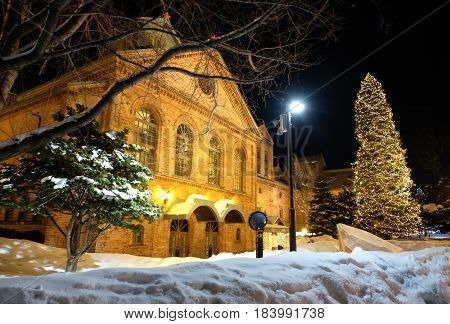 SAPPORO JAPAN - JANUARY 18 2017: Sapporo Beer Museum at night. The building was first opened as Kaitakushi Brewery in 1876