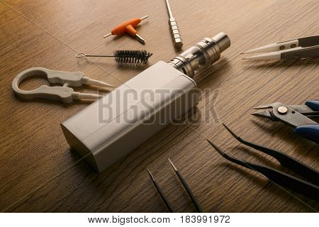 Vape Device Or Electronic Cigarette With Vaping Tools And Accessories.