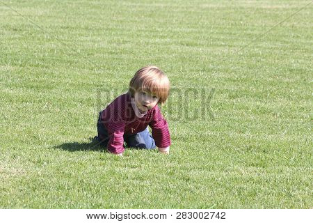 Little Girl Portrait In The Urbain Squatting