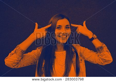 Girl Fingers Near The Temples Duotone Yellow Tit Color