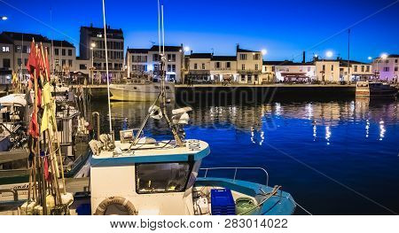Main Port Of The Yeu Island With Its Picturesque Architecture And Its Fishing Boats
