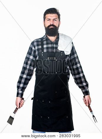 Roasting And Grilling Food. Man Hold Cooking Utensils Barbecue. Tools For Roasting Meat Outdoors. Pi
