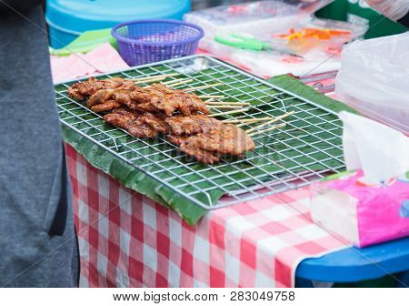 Traditional Street Food Cuisine, Thai Marinated Pork Skewers (moo Ping, Barbecue Pork Skewers), Gril