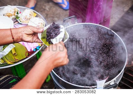 Traditional Thai Black Steamed Sticky Rice In Hot Steamer, Delicious Wholegrain Alternative To White