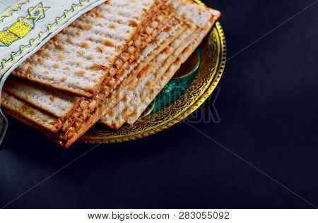 Close Up Of Concept Jewish Holiday Passover Matzot And Tallit Bread On The Jewish Holiday.