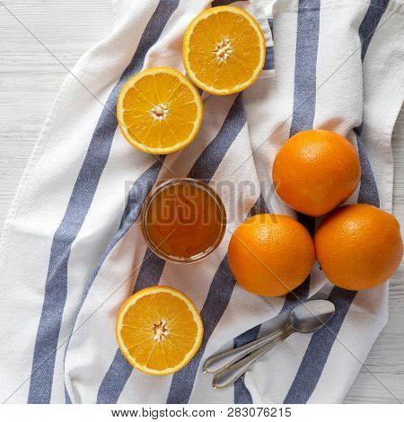 Top View, Homemade Orange Marmelade On A White Wooden Surface. Flat Lay, Overhead, From Above. Close