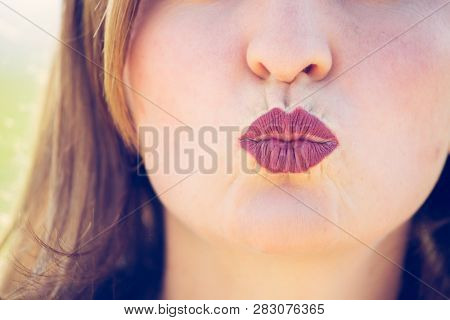 Cherry Red Lips Of Young Girl Are Kissing