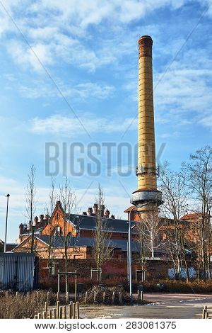 The Chimney Of A Brick In An Old Gasworks In Poznan