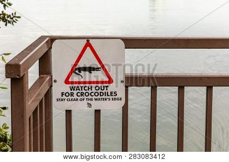Crocodile Warning Sign In Front Of The Ocean In Sungei Buloh Wetland Reserve In Singapore - December