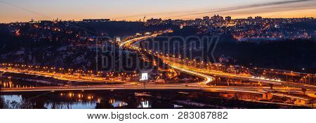 View Of Barrandov Bridge Over Vltava River In Branik, Prague, Czech Republic. Illuminated Roads In C