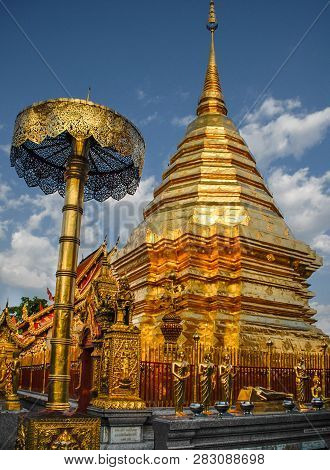 Beautiful Golden Buildings And Statues Within The Temple Complex..