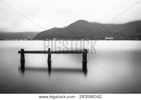 Long Exporure Of Some Wooden Struture In Lake Kawaguchi Near Mount Fuji