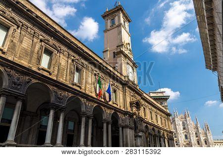 Duomo Di Milano Cathedral On Piazza Del Duomo Square And Palazzo Giureconsulti Palace With Clock Tow