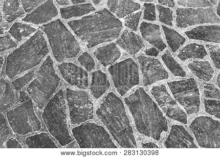Harmonic Pattern Of Slate Tiles At The Floor