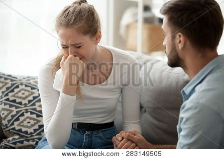 Loving Husband Man Comforting Consoling Upset Crying Wife Woman