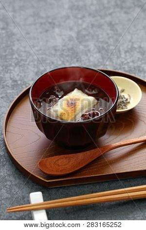 oshiruko, sweet red bean soup with grilled mochi (rice cake), japanese traditional dessert
