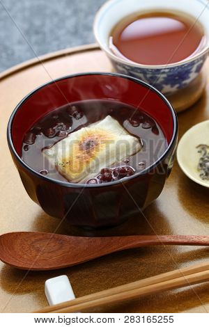 oshiruko, sweet red bean soup with grilled mochi (rice cake), japanese traditional dessert

