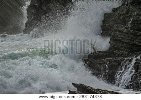 Sea Waves Breaking In The Coast Cliffs In Barrika