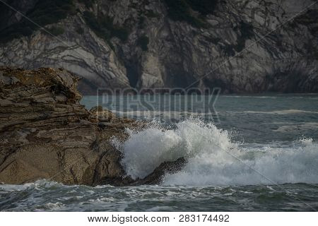 Sea Waves Breaking In The Coast Cliffs In Barrika