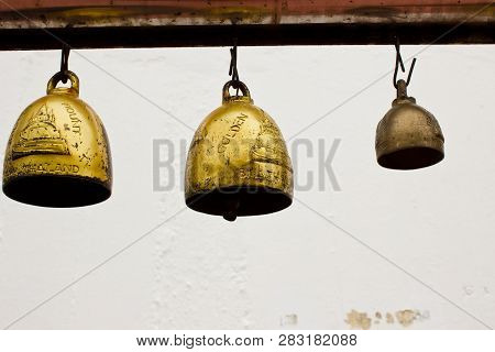 Golden Bell In Thai Temple On White Background