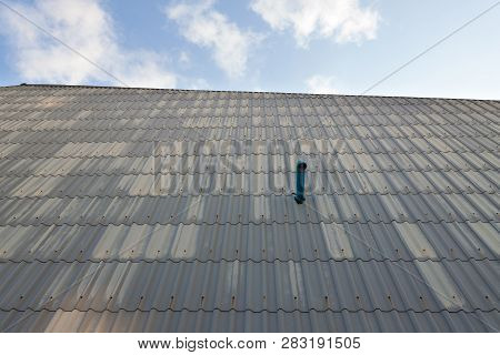 Roof Ventilation Pipe On Nature Background. Industrial Background.